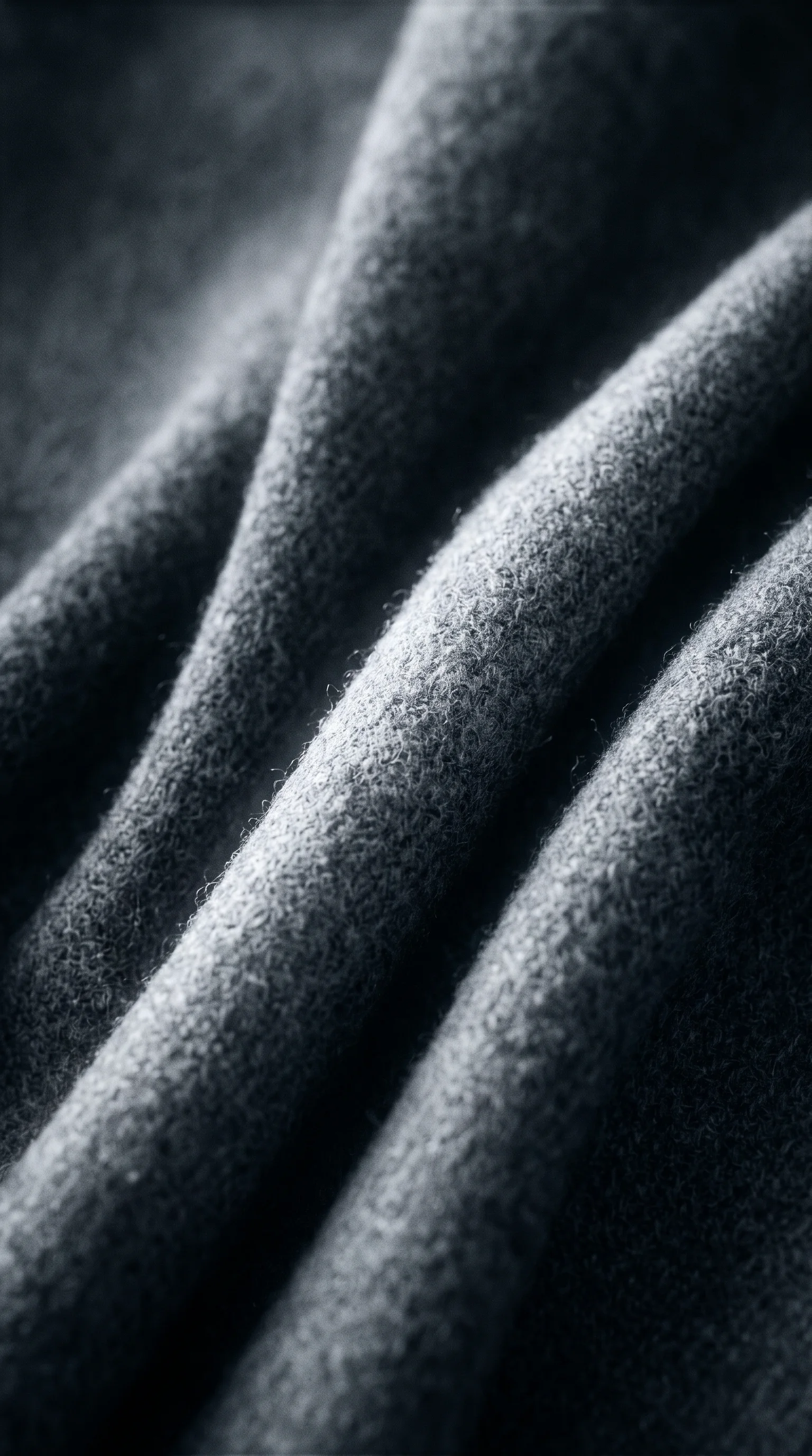 Folds of Charcoal Wool in Selenium Monochrome — AI-generated photograph
