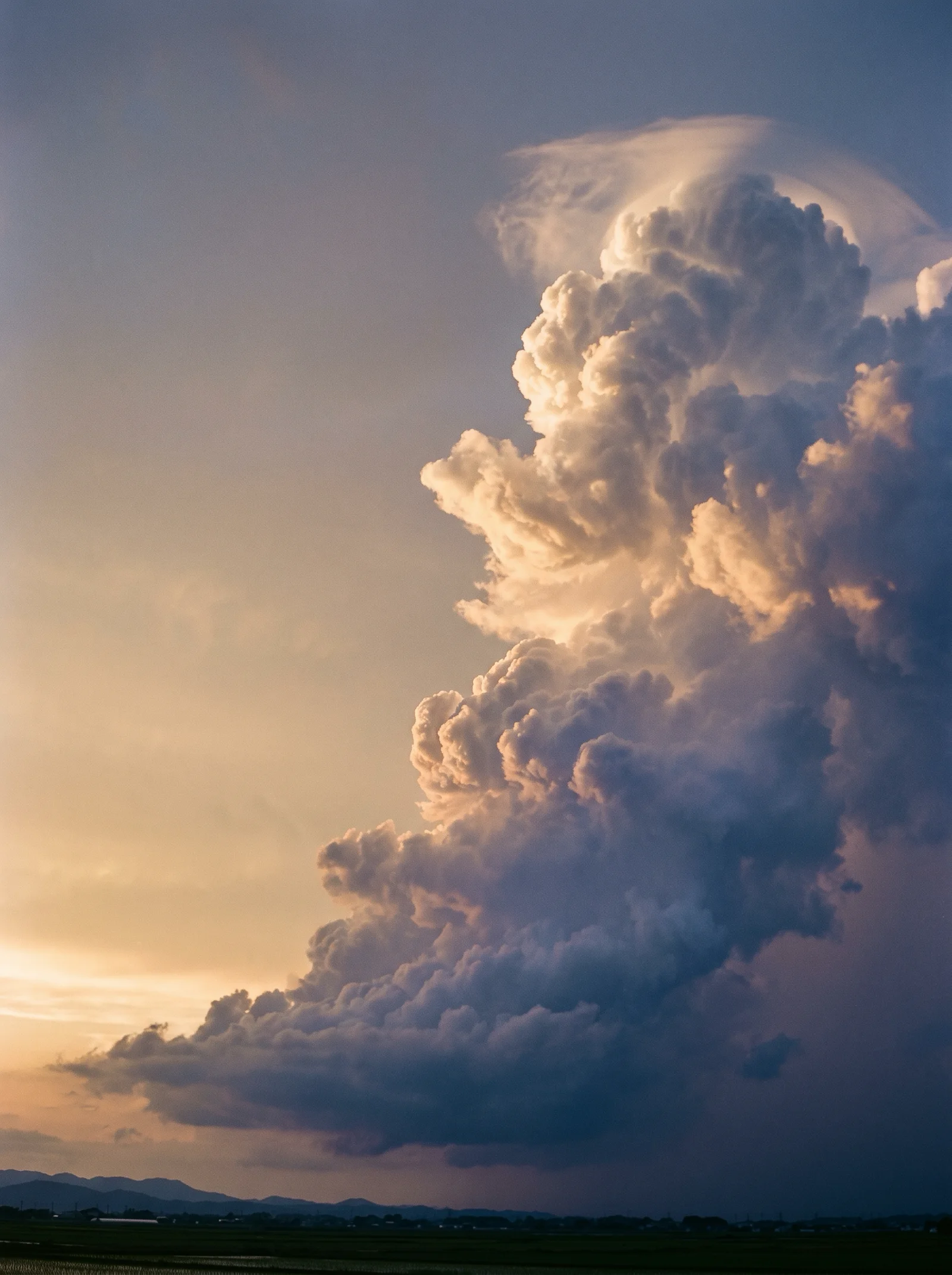 Evening Cumulonimbus Tower After a Summer Shower — AI-generated photograph