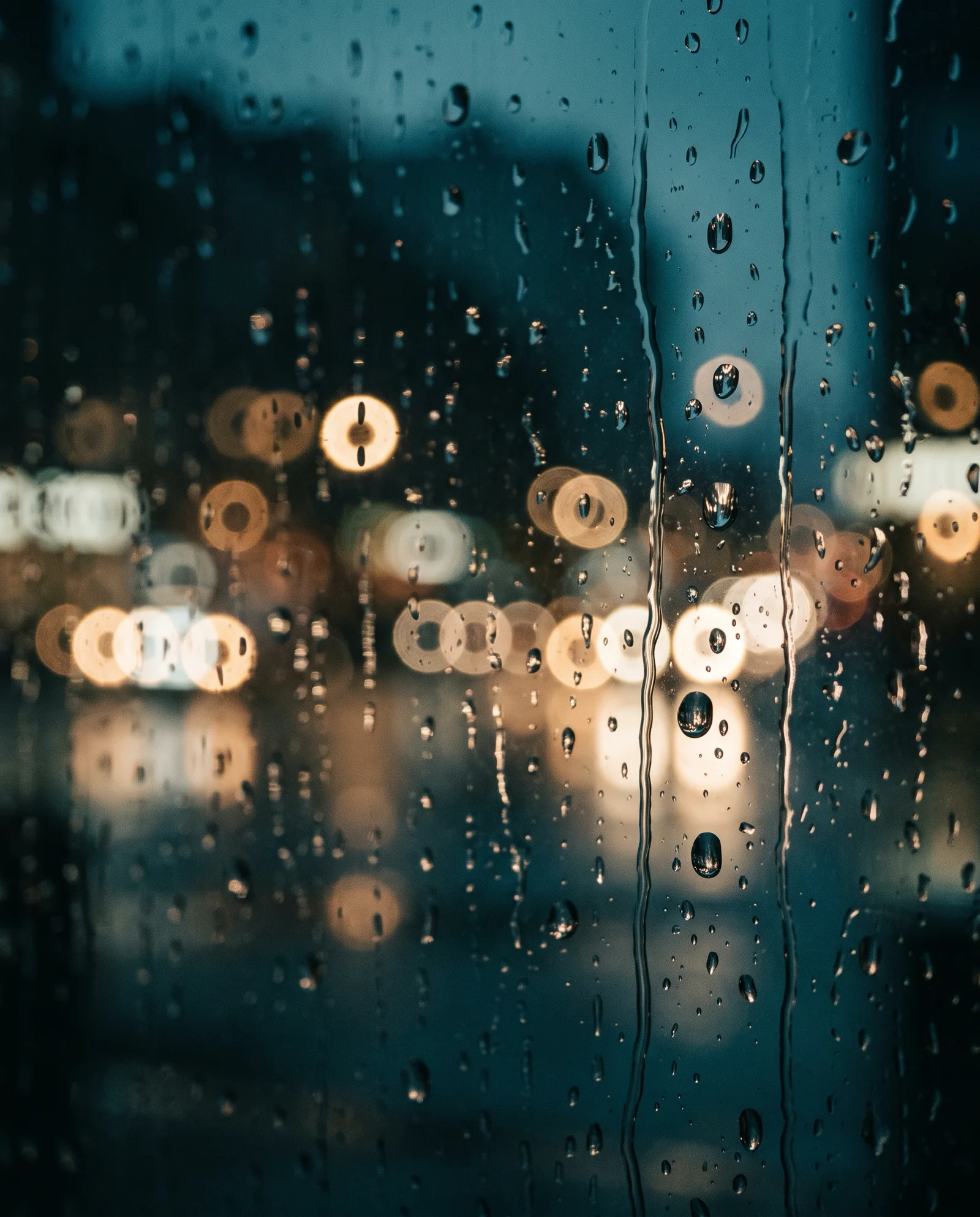 Raindrops on Glass With Ring-Shaped Bokeh — AI-generated photograph