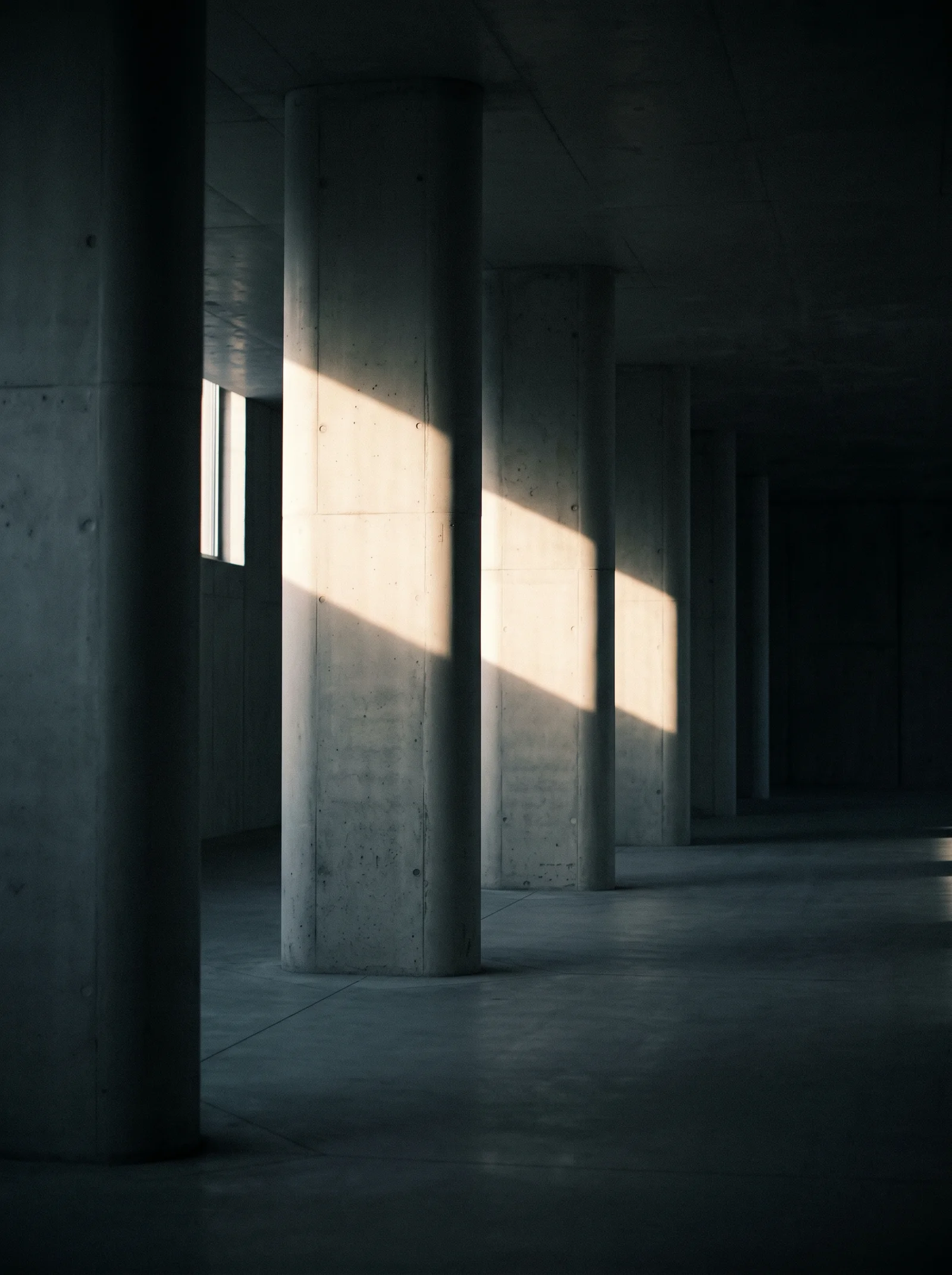 Station Colonnade in Low Raking Light — AI-generated photograph