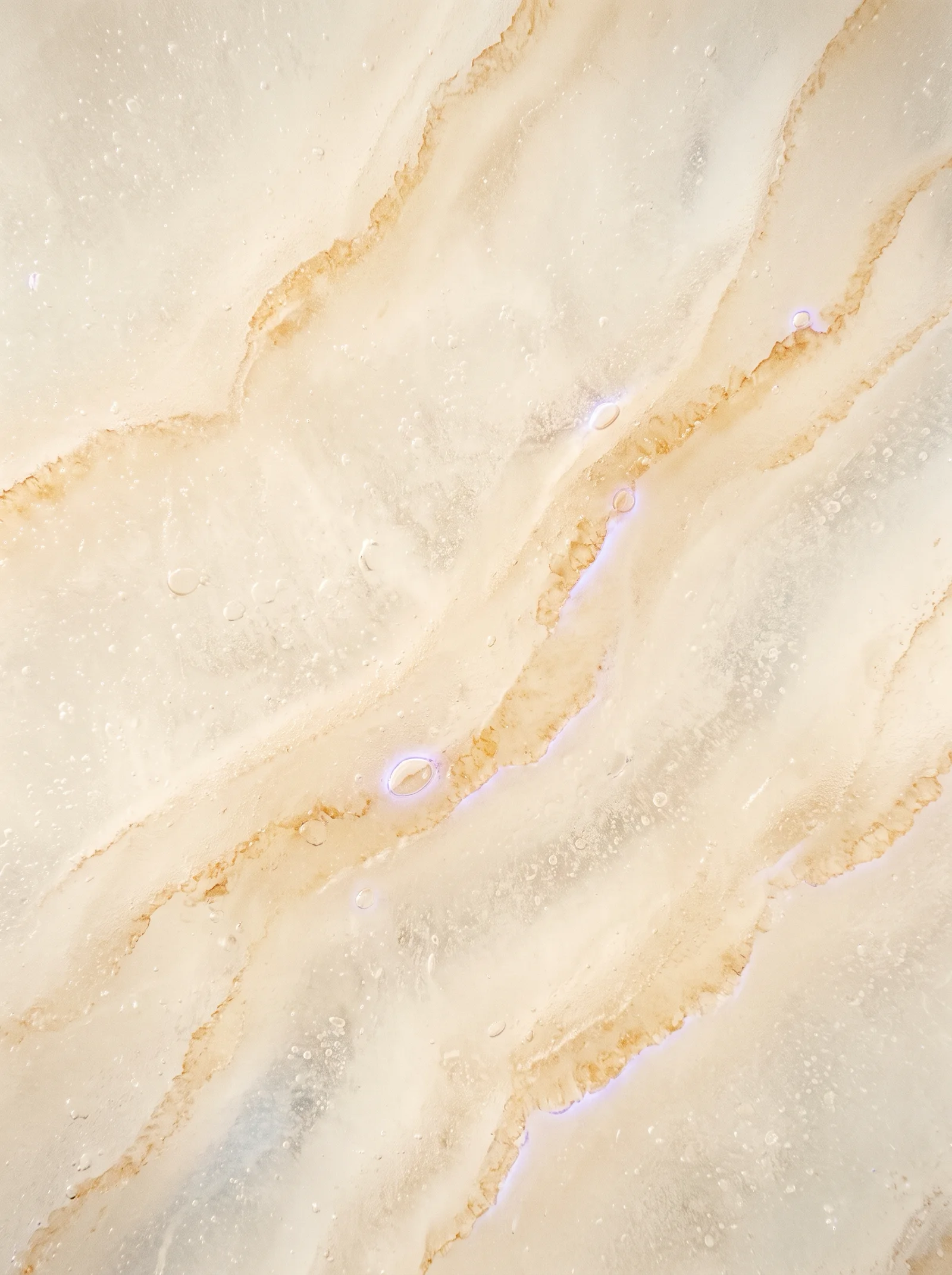 Amber-Tinted Ice Surface with Golden Veins — AI-generated photograph