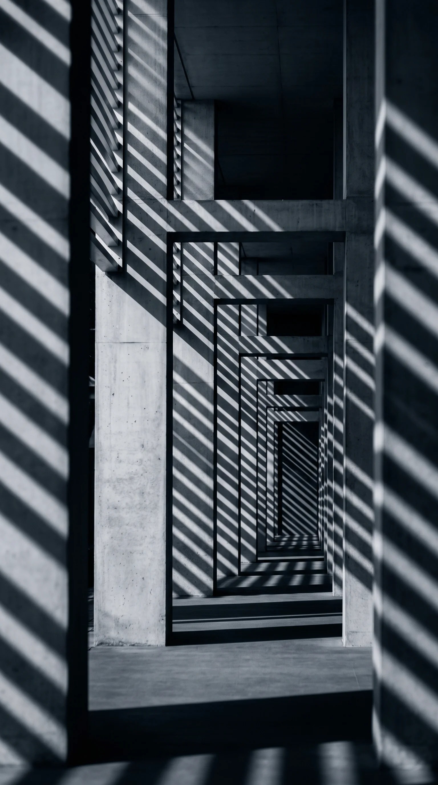 Slatted Light on a Concrete Colonnade in Monochrome — AI-generated photograph