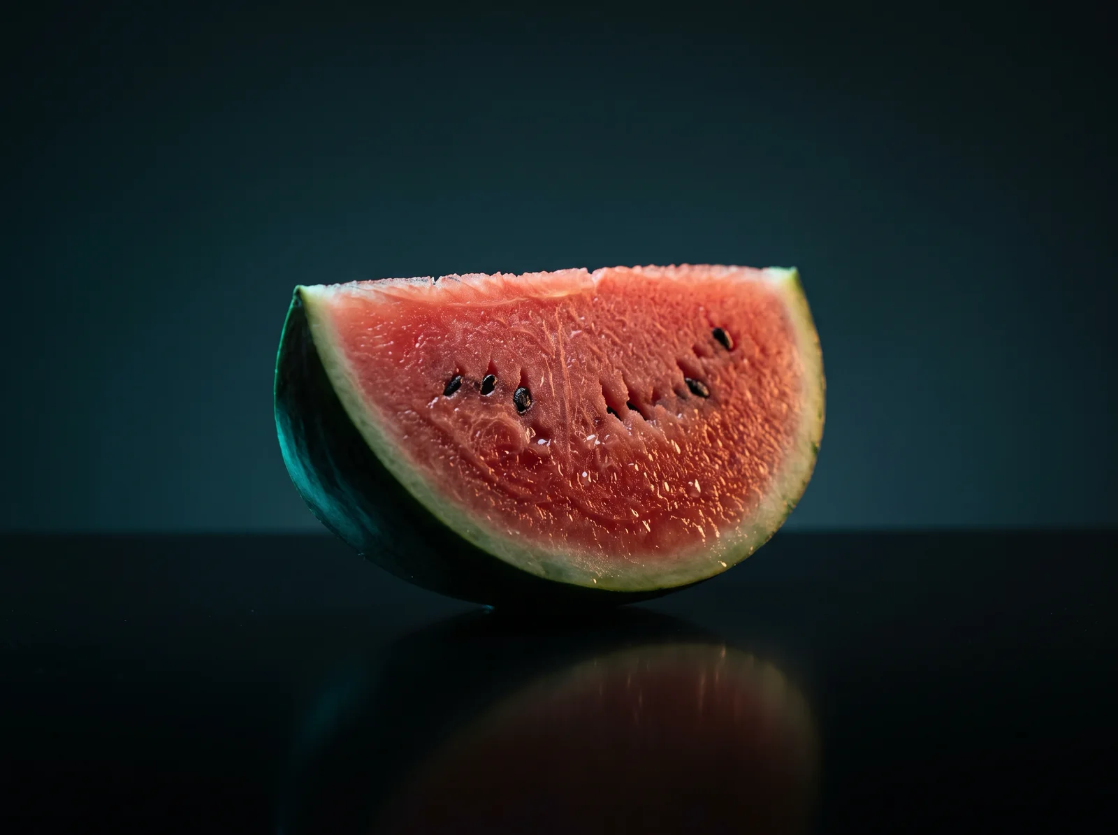 Watermelon Wedge on a Black Acrylic Mirror — AI-generated photograph