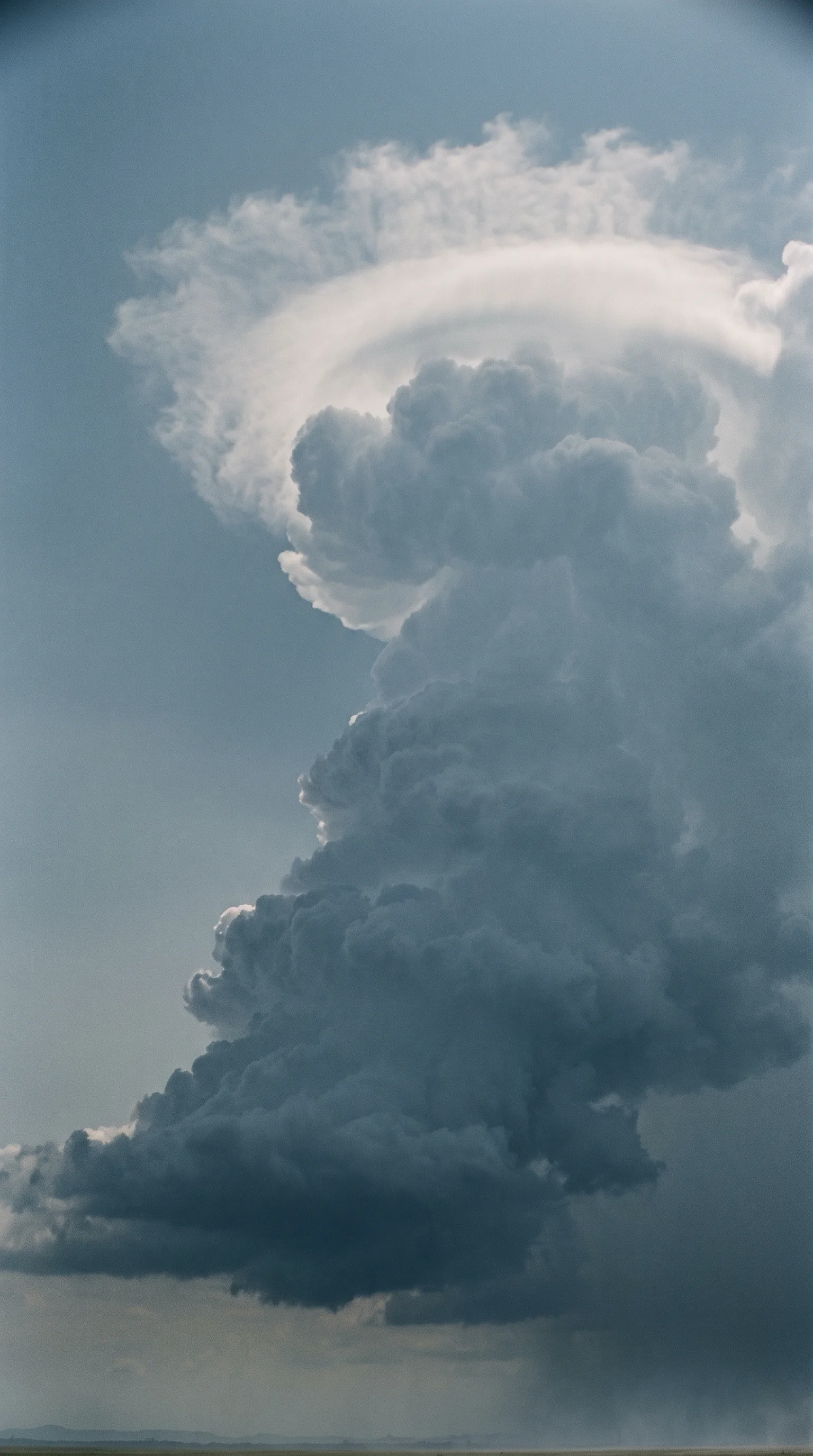 Low-Angle View of a Towering Thundercloud — AI-generated photograph