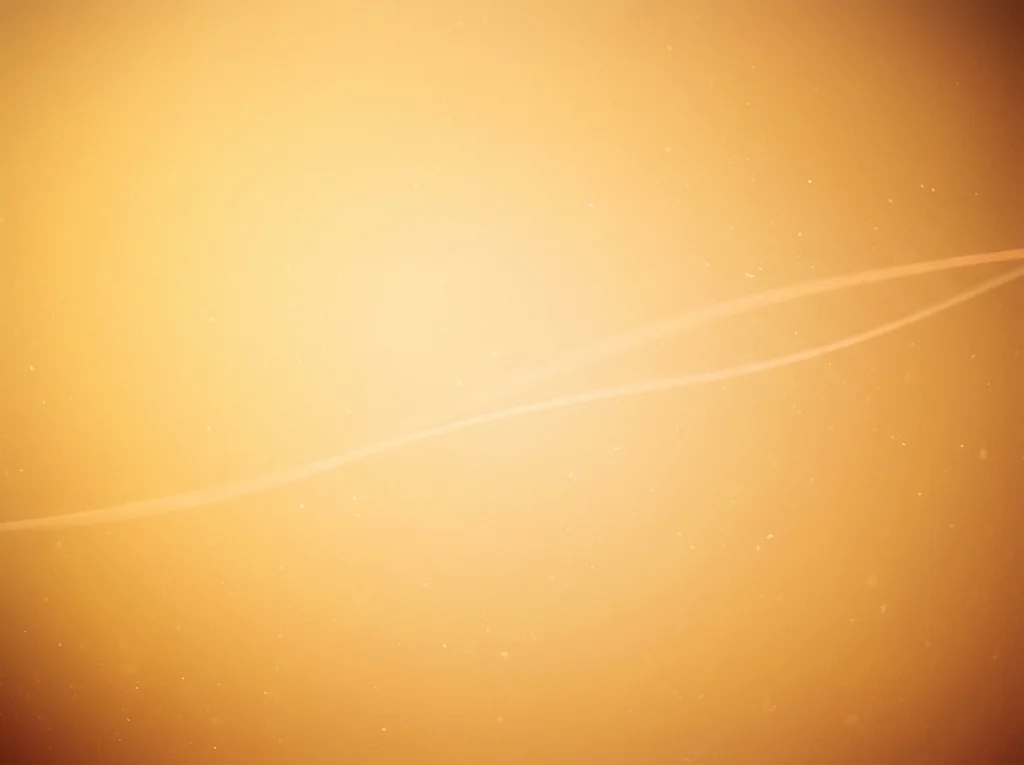 Amber Light Field With Drifting Dust — AI-generated photograph