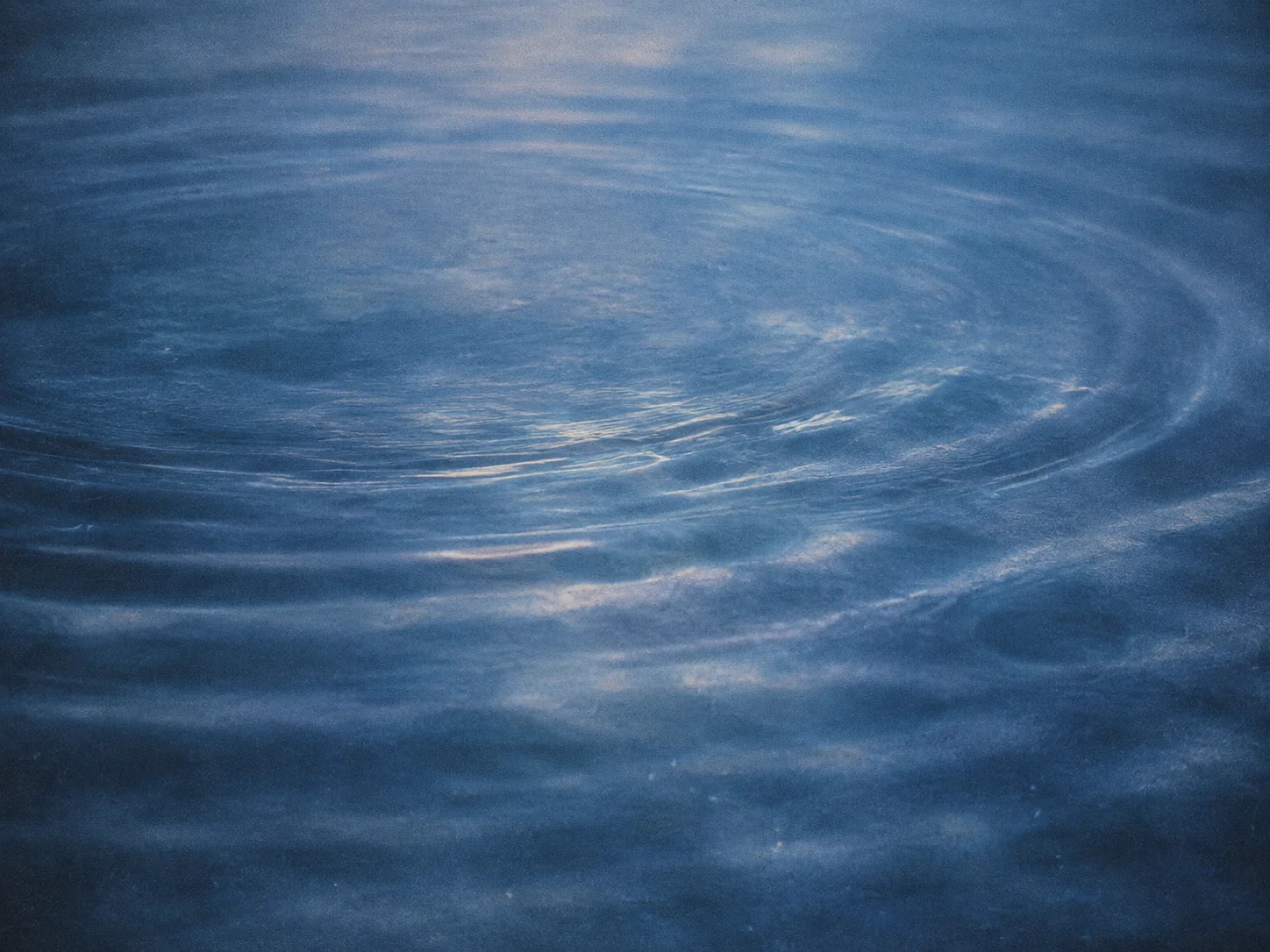 Blue Water Ripples Filling the Frame — AI-generated photograph