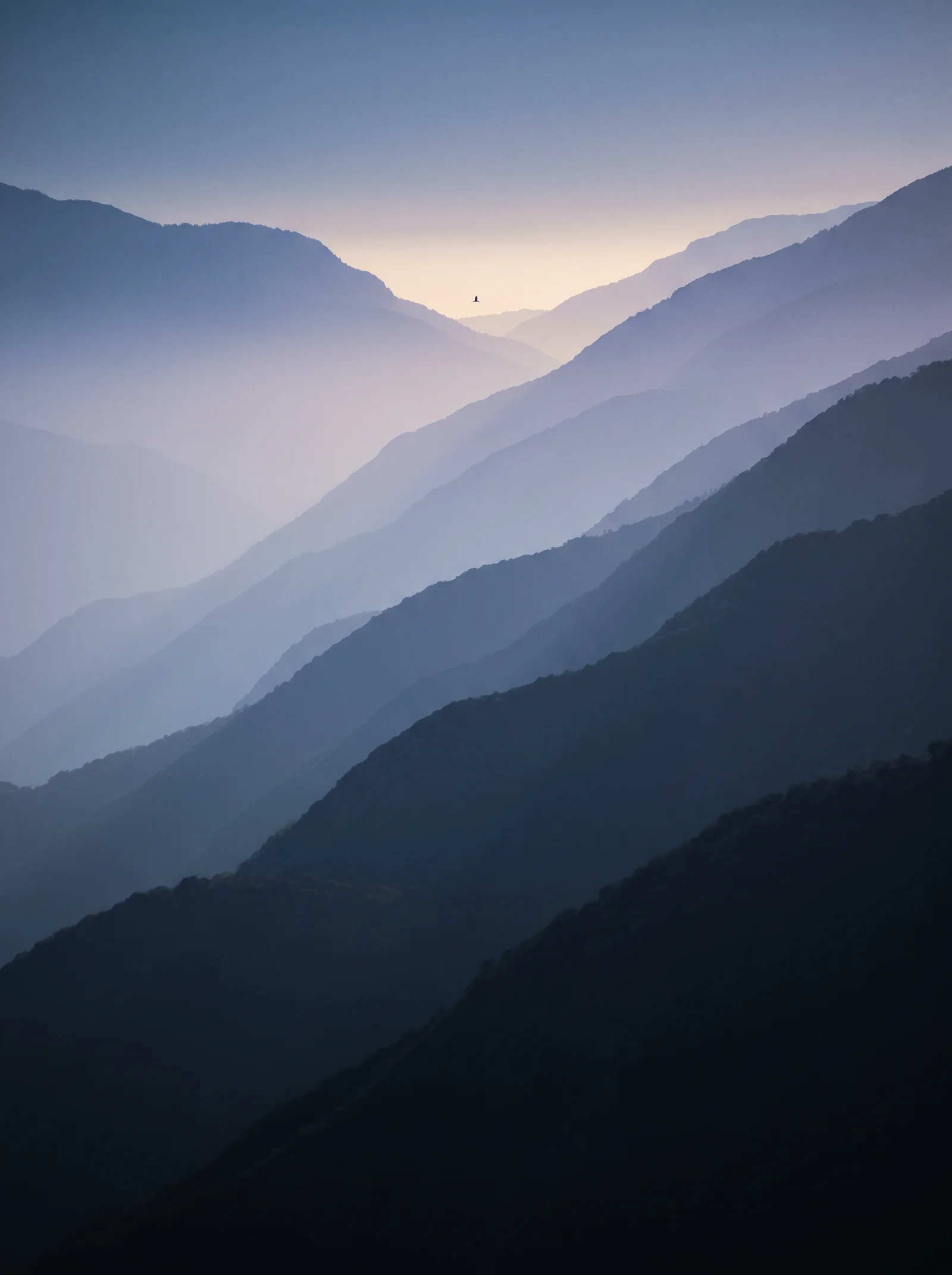 Blue-Violet Ridgelines at Dusk in Fog — AI-generated photograph