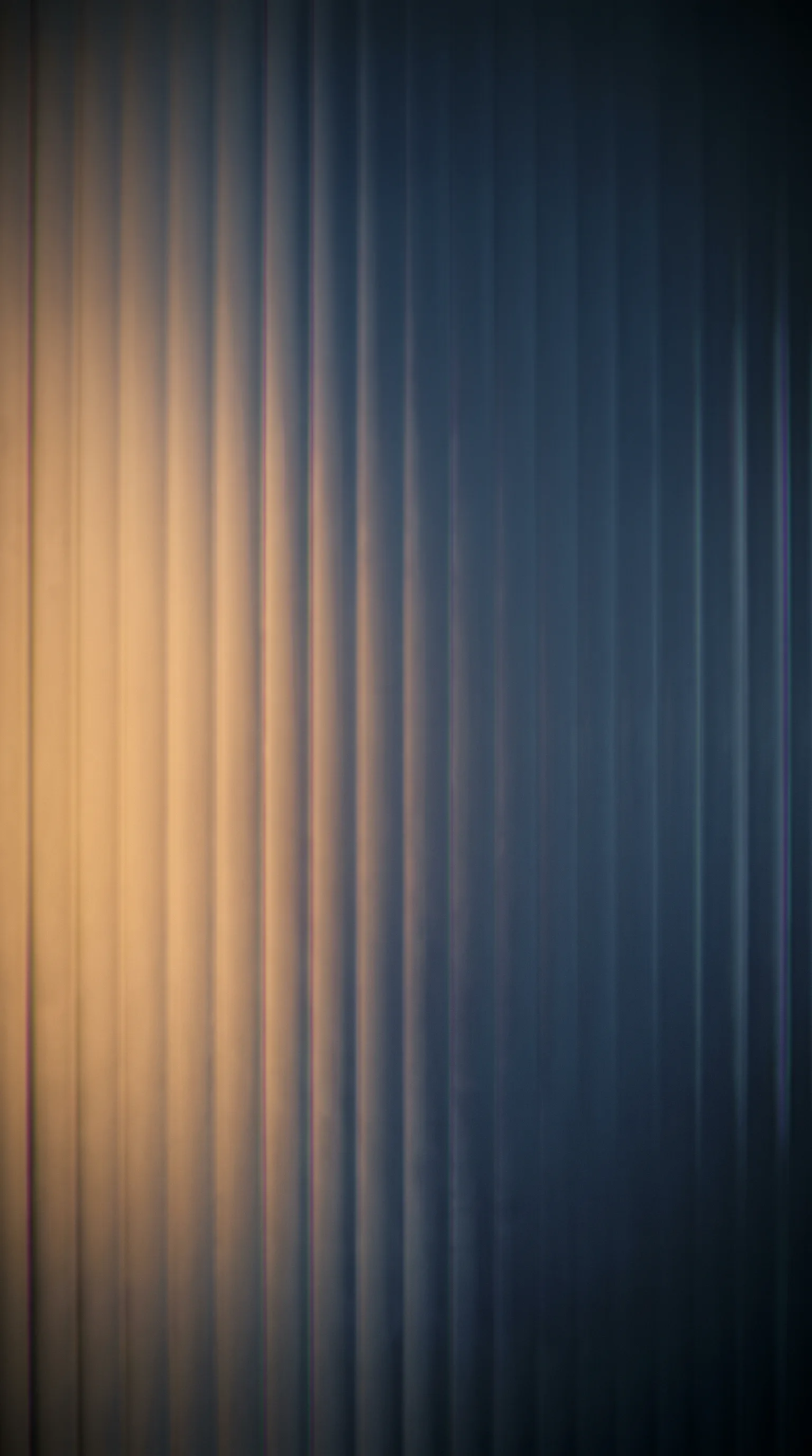 Fluted Glass Combing an Amber to Blue Field — AI-generated photograph