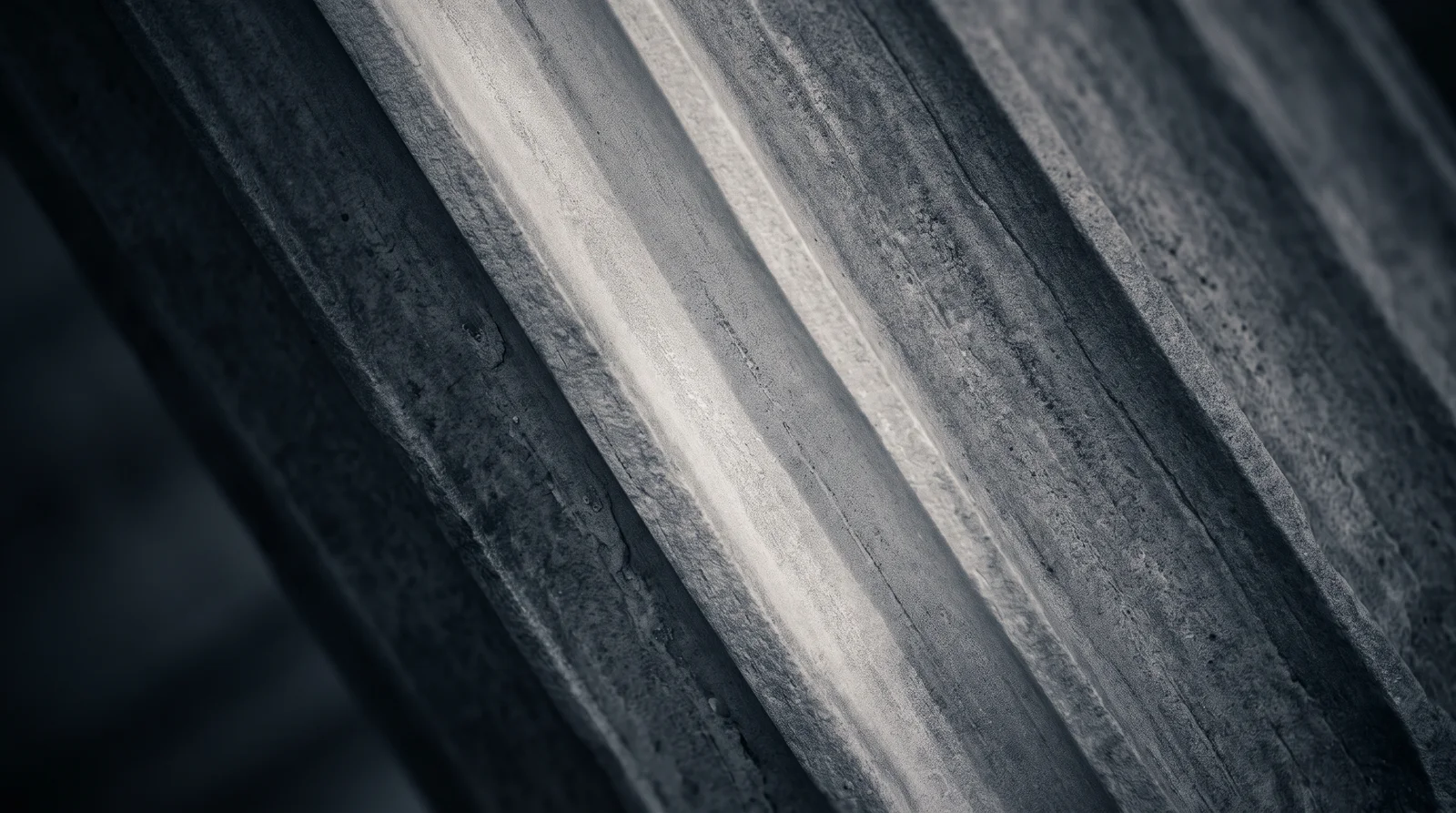 Fluted Stone Column Shafts in Monochrome — AI-generated photograph