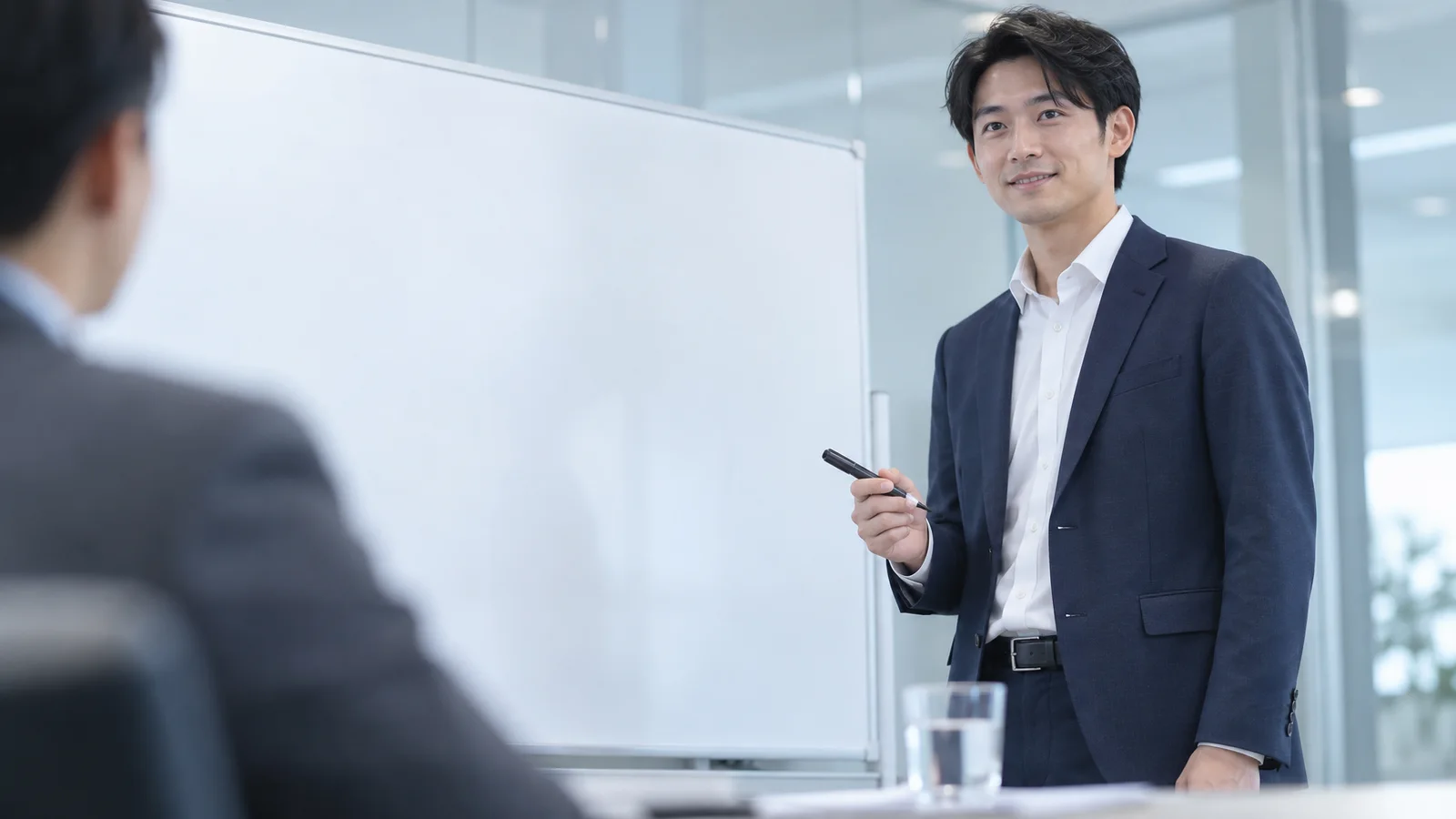 Man Holding a Marker Beside Whiteboard — AI-generated photograph