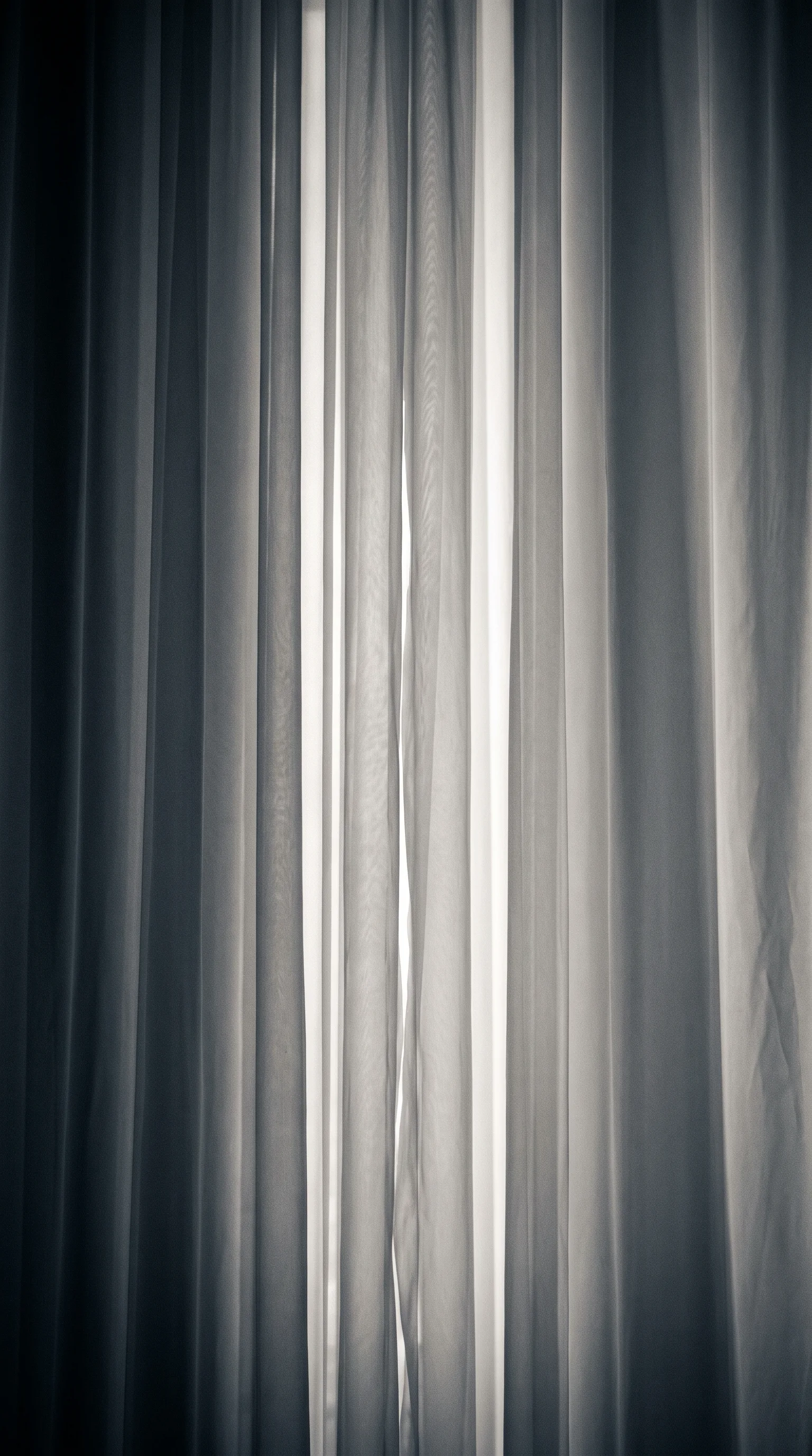 Sheer Fabric Folds in Vertical Silver Monochrome — AI-generated photograph