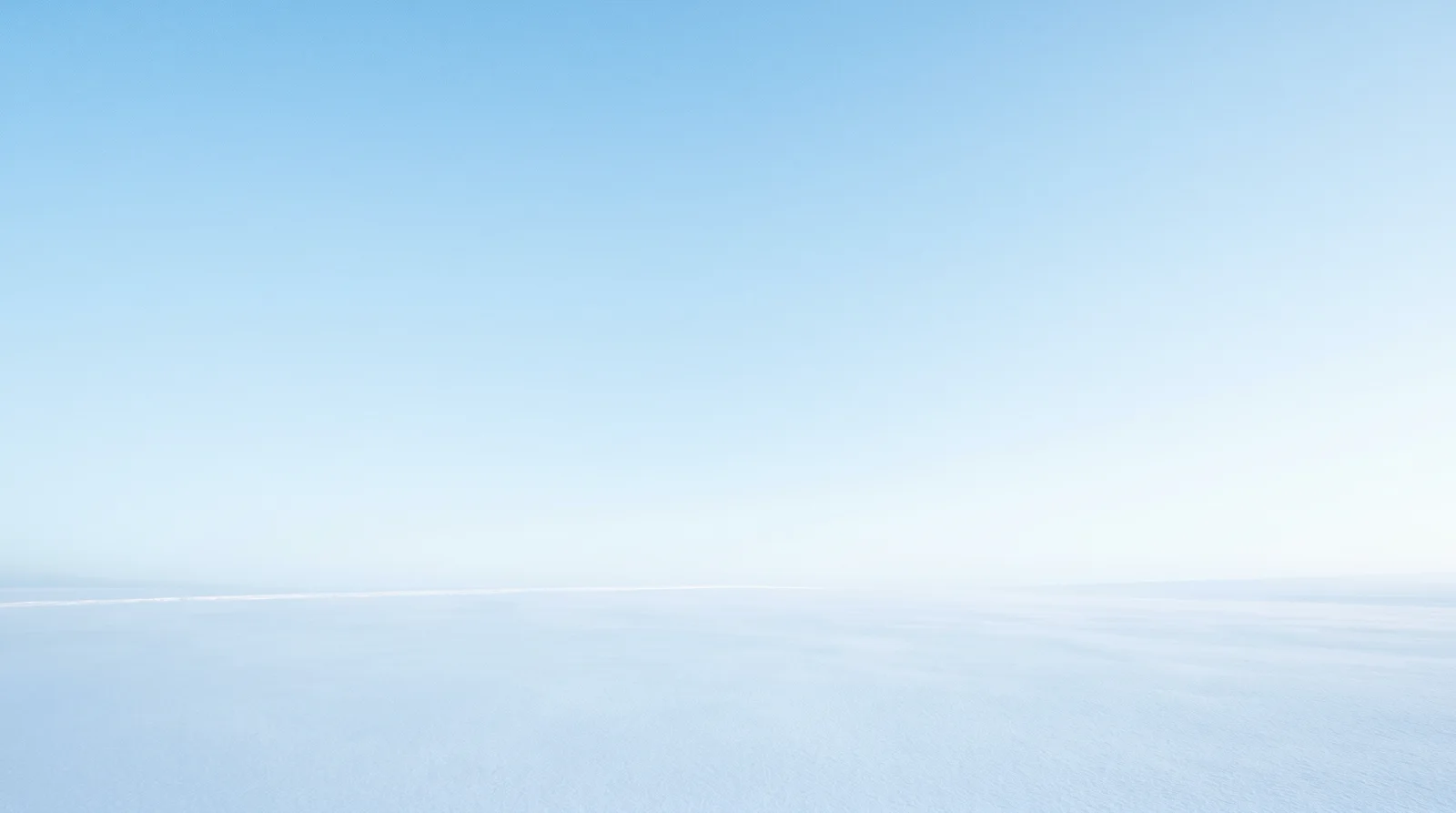 Pale Blue Sky over an Empty Snowfield — AI-generated photograph