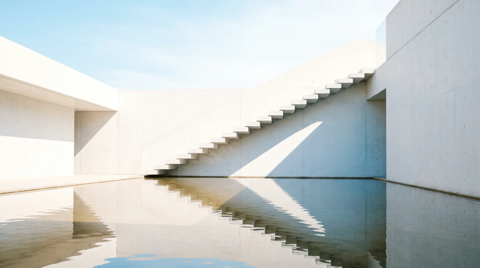White Concrete Building Mirrored in a Courtyard Pool — AI-generated photograph