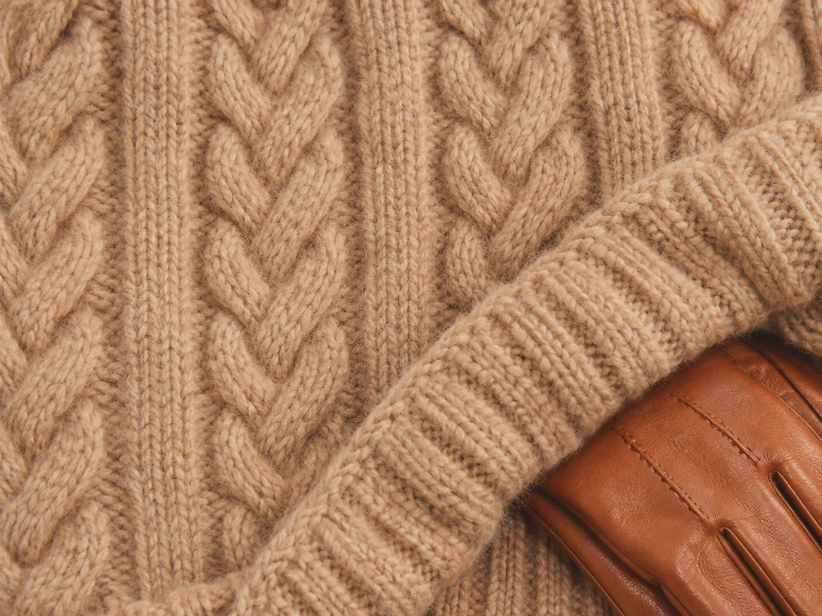 Cable Knit Folded Over a Leather Glove — AI-generated photograph