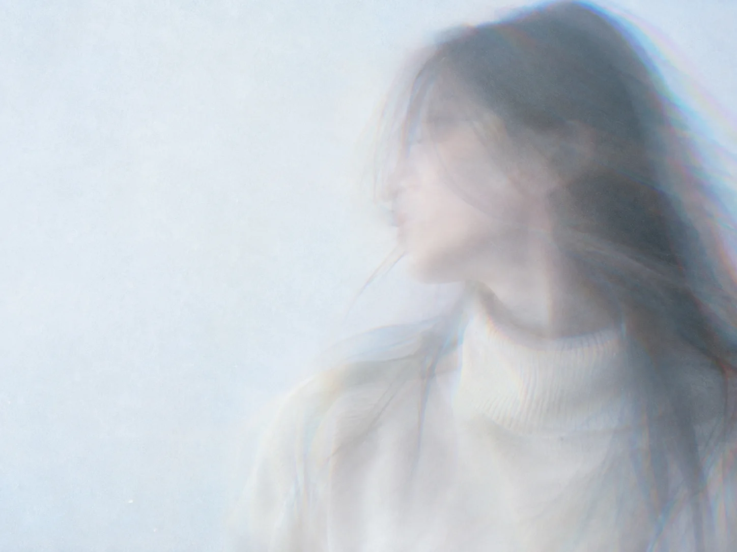 Translucent Profile with Pale Rainbow Motion Trails — AI-generated photograph