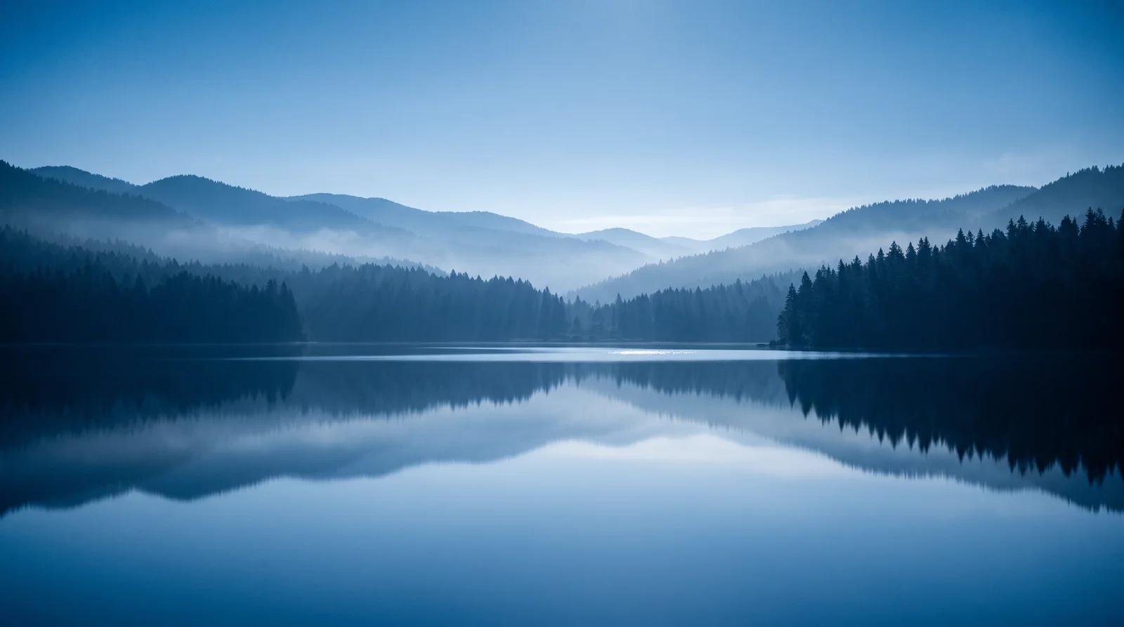 Conifer Ridges Mirrored on a Dawn Lake — AI-generated photograph