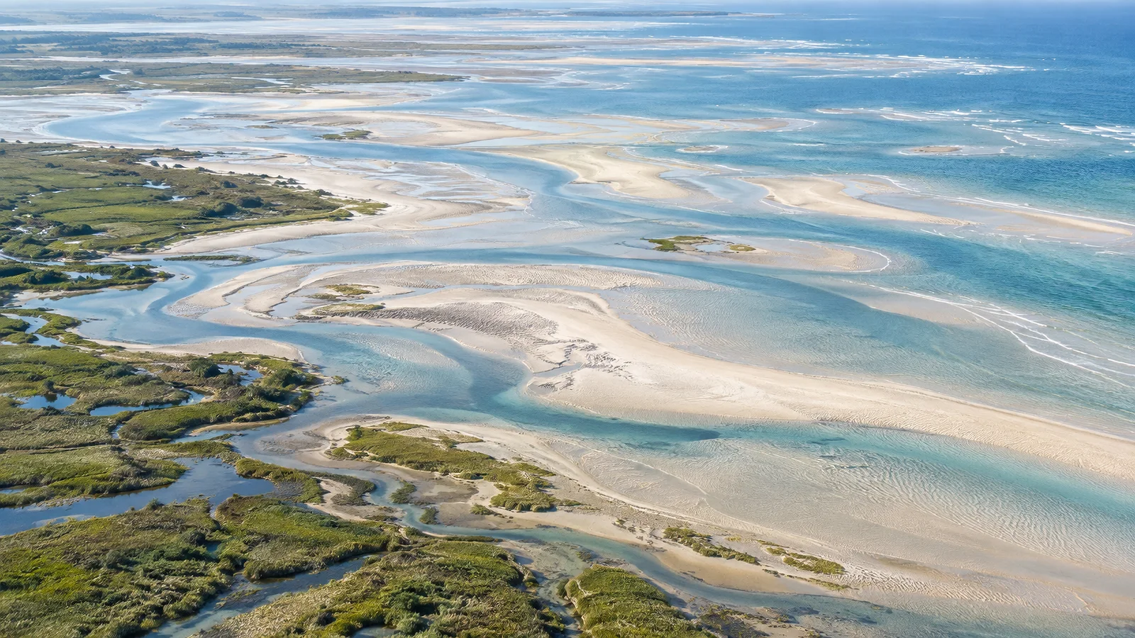 Aerial View of Sandbars and Tidal Channels — AI-generated photograph