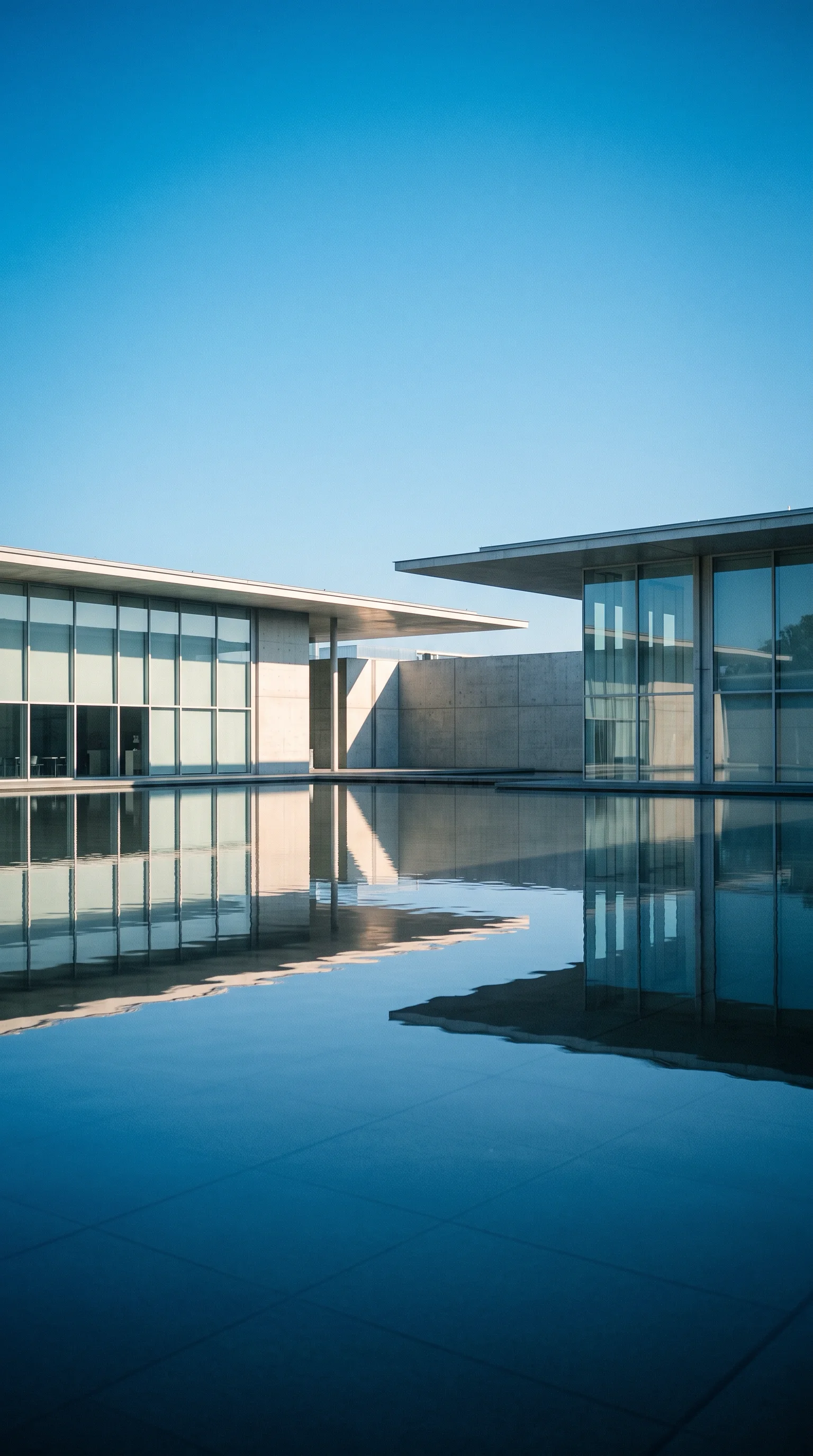 Glass Tower and Its Reflection Stacked in Blue — AI-generated photograph