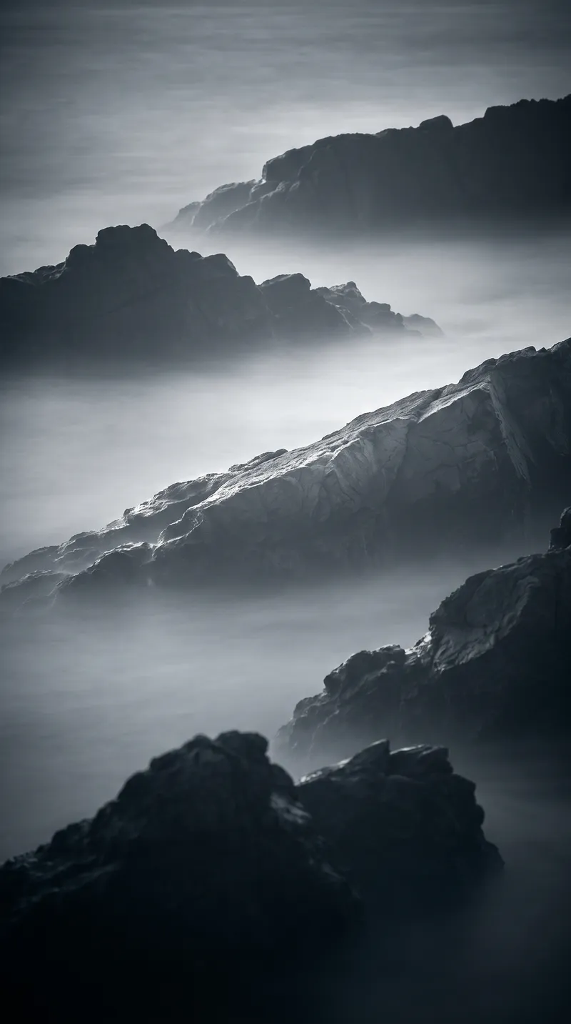 Sea Stacks in Fog in Monochrome — AI-generated photograph