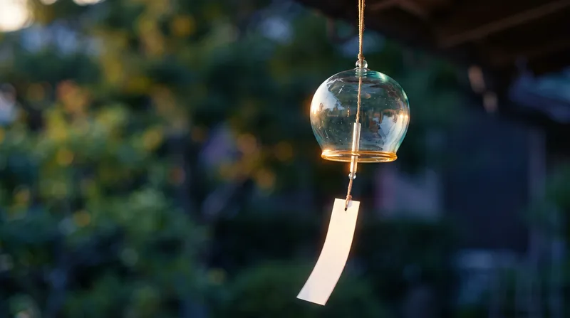 Backlit Glass Wind Chime at Dusk — AI-generated photograph