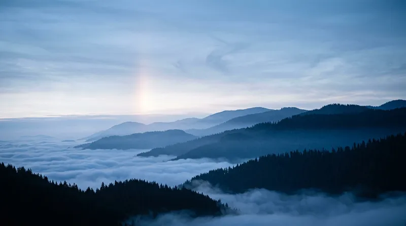 Layered Forest Ridges Above a Sea of Clouds — AI-generated photograph
