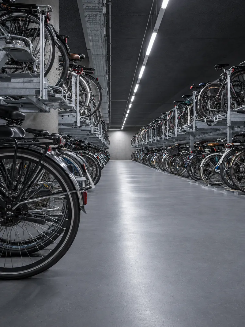 Bicycles Along a Blue Underground Aisle — AI-generated photograph