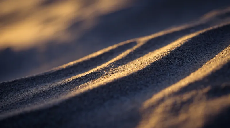 Golden Dune Ripples With Violet Shadows — AI-generated photograph