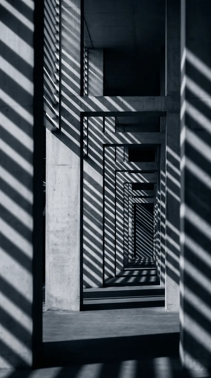 Slatted Light on a Concrete Colonnade in Monochrome — AI-generated photograph