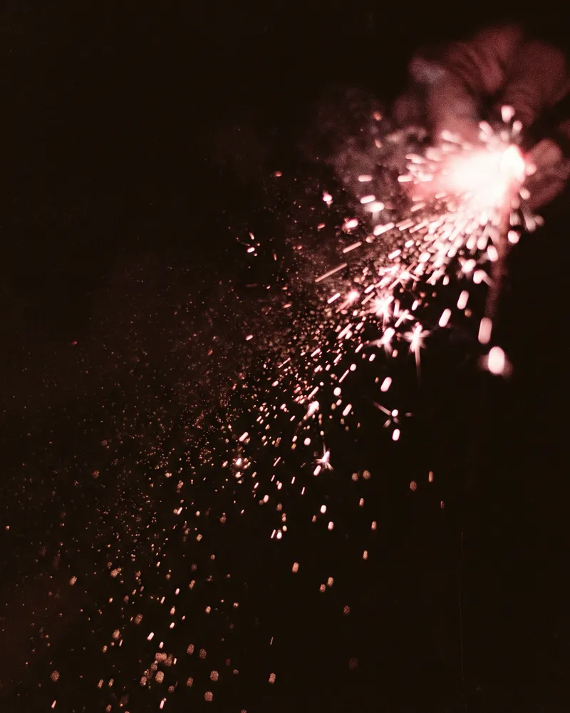 Glowing Sparkler Ball and Falling Sparks — AI-generated photograph