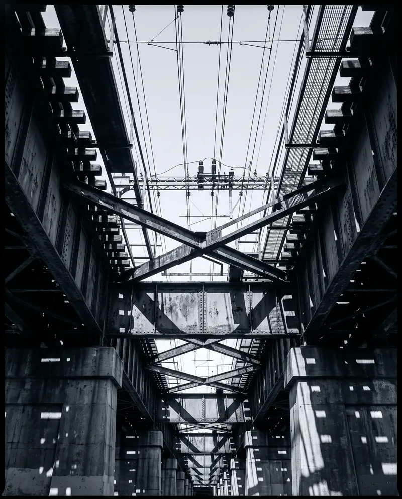 Steel Girders Seen from Below a Viaduct — AI-generated photograph
