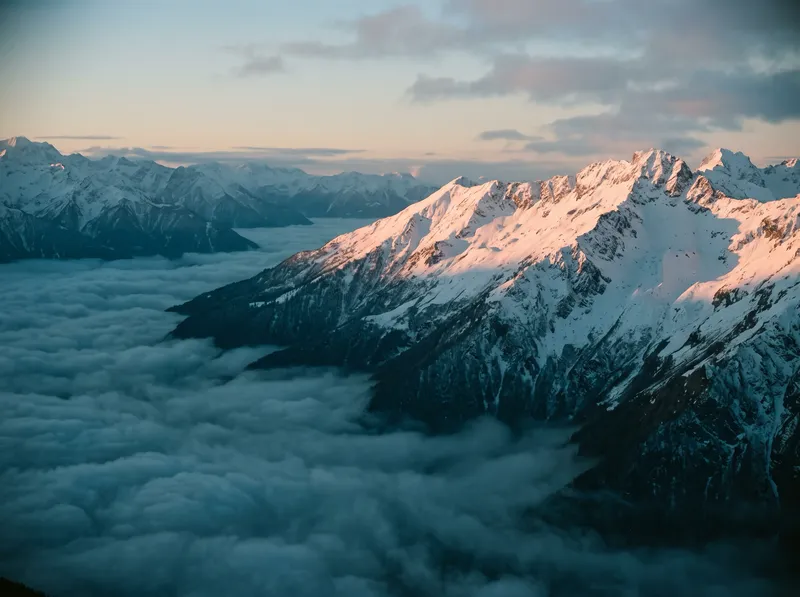 Snow Ridge in Honeyed Alpenglow Over a Teal Valley — AI-generated photograph