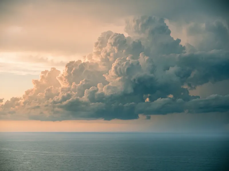 Towering Cumulonimbus Over a Calm Summer Sea — AI-generated photograph