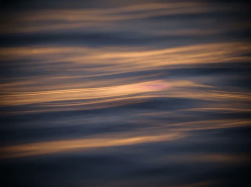 Caustic Light Net Over an Amber-Blue Field — AI-generated photograph