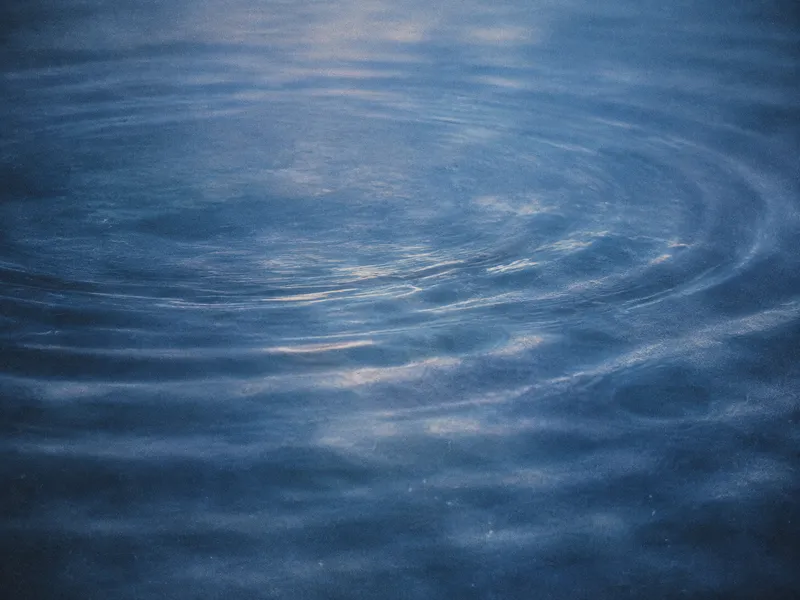Blue Water Ripples Filling the Frame — AI-generated photograph