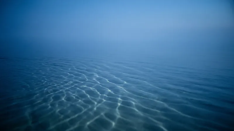 Aqua Caustic Net on Still Blue Water — AI-generated photograph