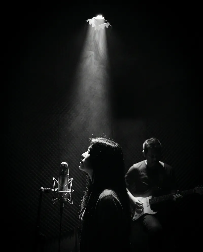 Singer and Guitarist Silhouettes in Darkness — AI-generated photograph