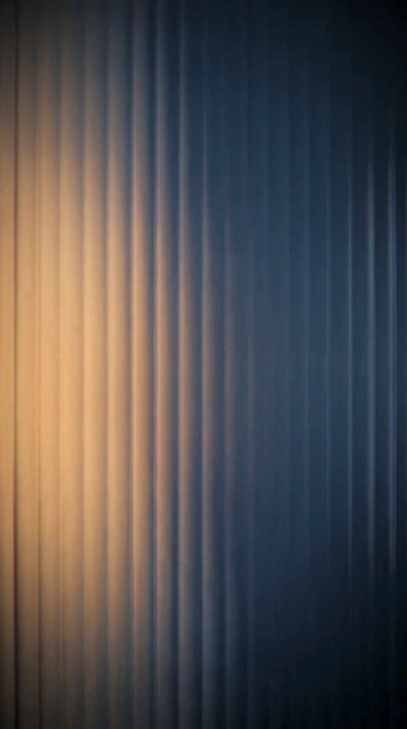Fluted Glass Combing an Amber to Blue Field — AI-generated photograph
