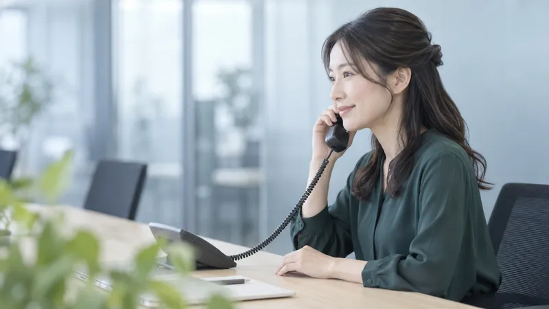 Woman Answering an Office Telephone — AI-generated photograph
