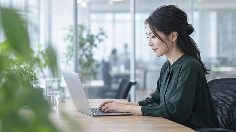 Woman Working at an Office Laptop — AI-generated photograph