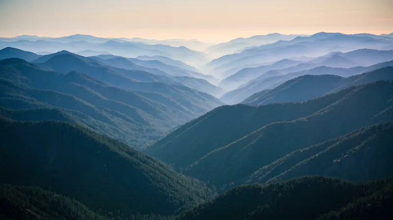 Layered Blue Mountain Ridges in Haze — AI-generated photograph