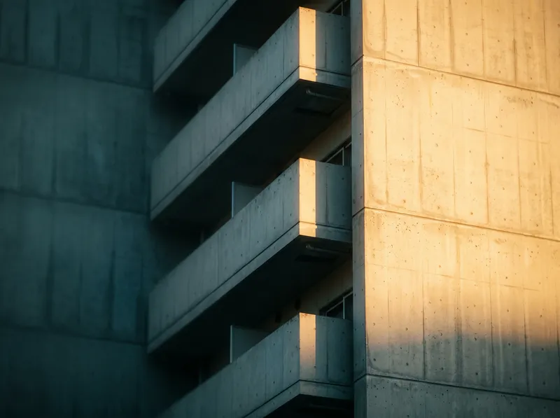 Sunlit Concrete Balconies in Amber and Teal — AI-generated photograph