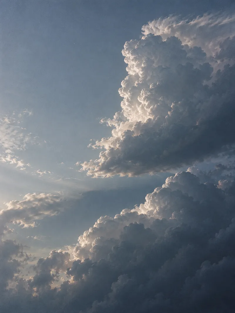 Silver Cloud Towers Divided by Blue Sky — AI-generated photograph