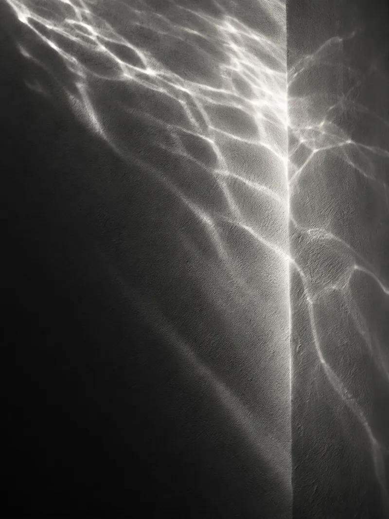 Caustic Network Across a Plaster Corner — AI-generated photograph