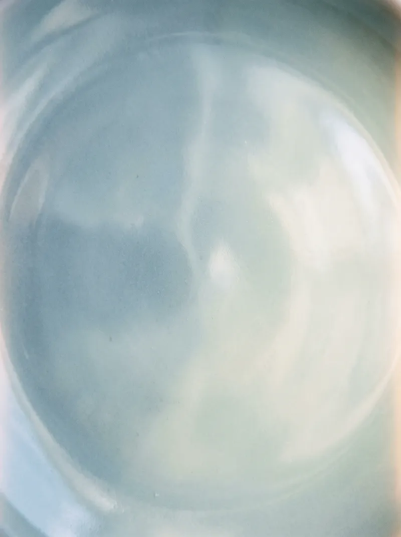 Pale Celadon Ceramic Glaze Surface — AI-generated photograph