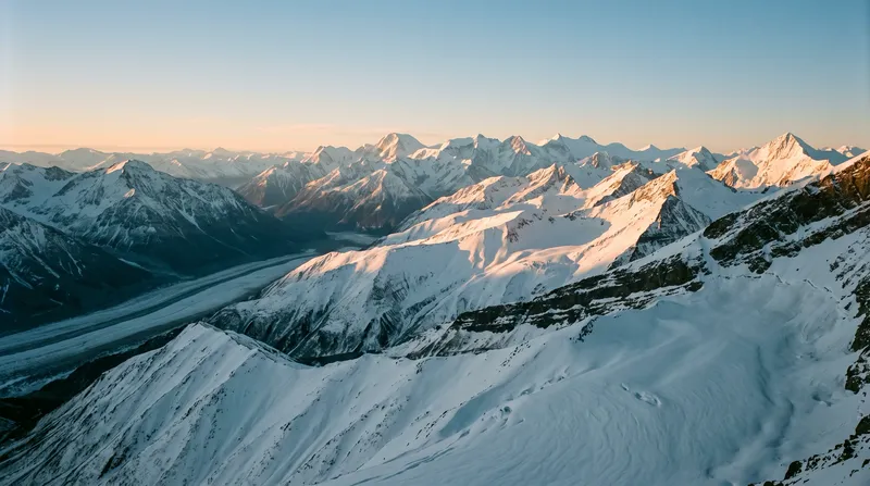 Snowcapped Mountain Ridges at Amber Dawn — AI-generated photograph