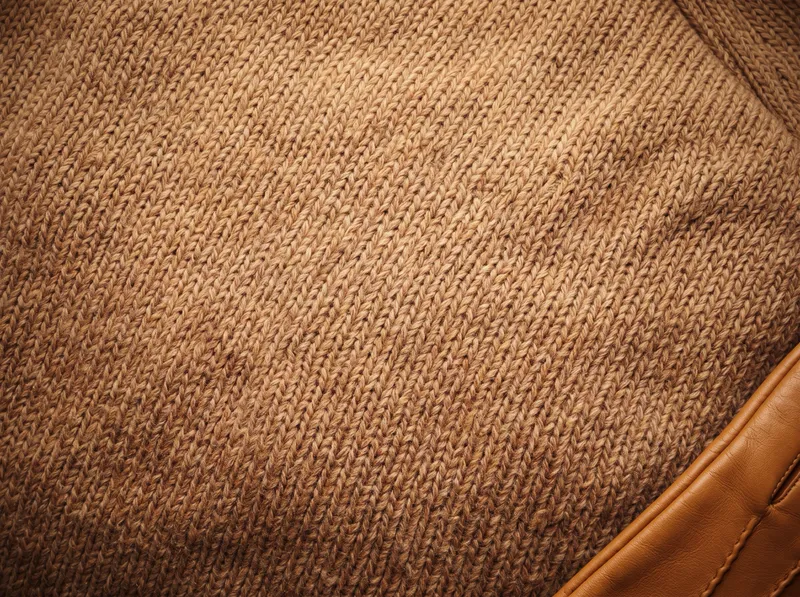 Camel Wool Knit and Leather Glove Close-up — AI-generated photograph